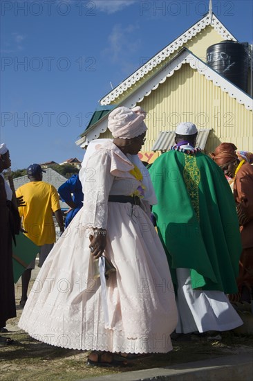 WEST INDIES, St Vincent & The Grenadines, Union Island, The Baptist congregation in Clifton at Easter morning harbourside service for those lost at sea