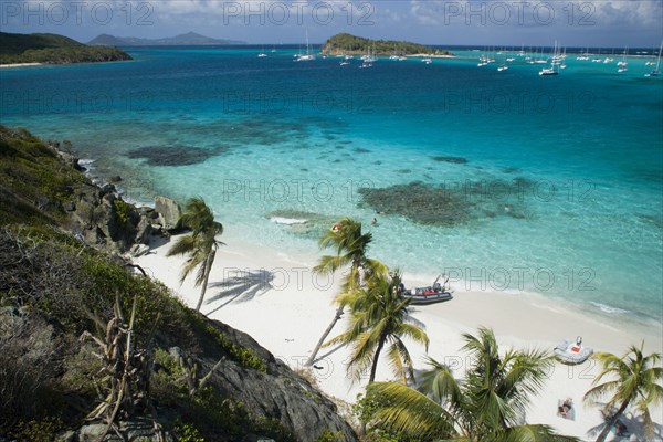 WEST INDIES, St Vincent & The Grenadines, Tobago Cays, Looking over the Cays and moored yachts towards Canouan on the horizon  from Jamesby Island