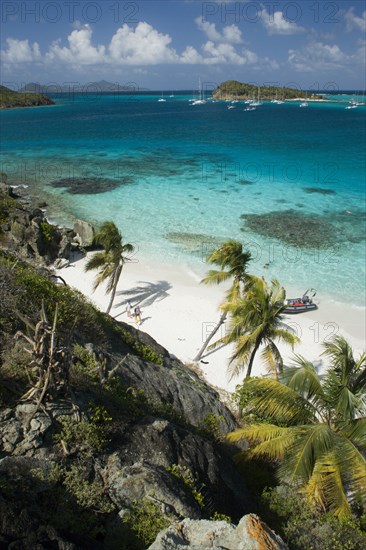 WEST INDIES, St Vincent & The Grenadines, Tobago Cays, Looking over the Cays and moored yachts towards Canouan on the horizon  from Jamesby Island