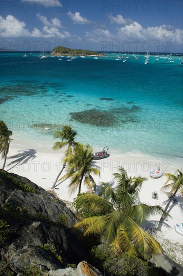 WEST INDIES, St Vincent & The Grenadines, Tobago Cays, Looking over the Cays and moored yachts towards Canouan on the horizon  from Jamesby Island