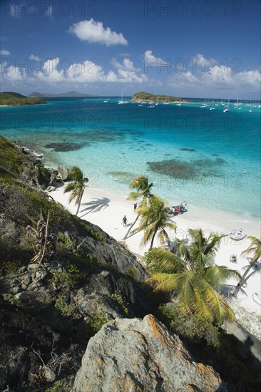 WEST INDIES, St Vincent & The Grenadines, Tobago Cays, Looking over the Cays and moored yachts towards Canouan on the horizon  from Jamesby Island