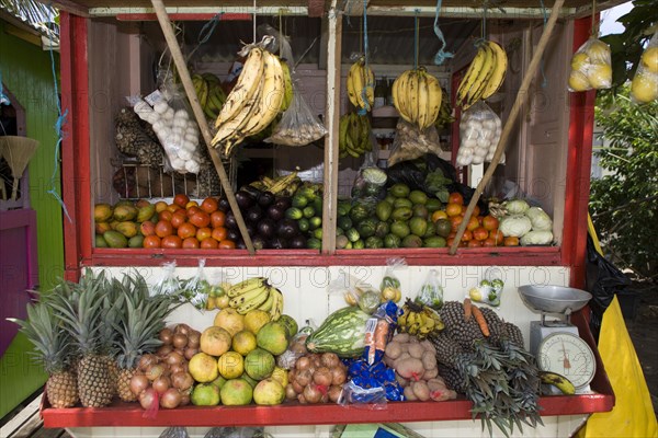 WEST INDIES, St Vincent & The Grenadines, Union Island, Fruit and vegetable market stall in Hugh Mulzac Square in Clifton