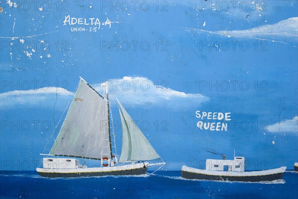 WEST INDIES, St Vincent & The Grenadines, Union Island, Wall painting in Clifton of water transport between the islands