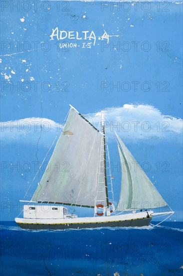 WEST INDIES, St Vincent & The Grenadines, Union Island, Wall painting in Clifton of water transport between the islands