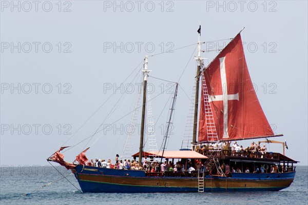 WEST INDIES, Barbados, St James, Jolly Roger tour boat full of tourists off Holetown