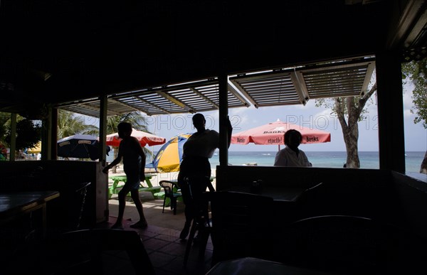 WEST INDIES, Barbados, St James, Staff at the Beachside Restaurant in Holetown