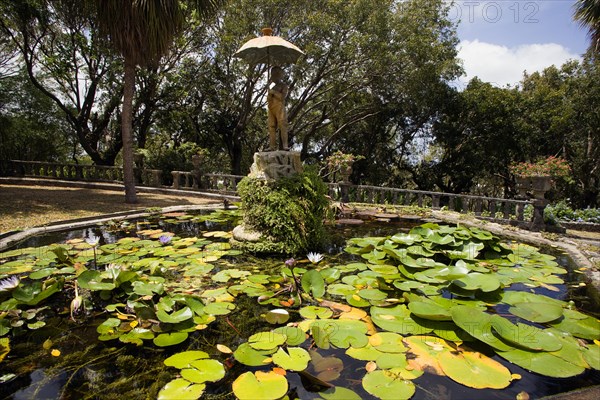 WEST INDIES, Barbados, St George, Francia plantation house gardens and waterlilly pond with fountain