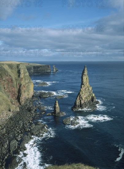 SCOTLAND, Highland, Duncansby Head, Stacks of Duncansby.  Pointed sea stacks off the North East coast.