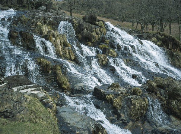 WALES, Snowdonia, Cwm y Llan Waterfall, Waterfall cascading over rocks in stream flowing south east from Snowdon to Nant Gwynant