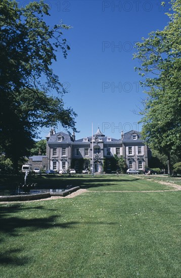 UNITED KINGDOM, Channel Islands, Guernsey, St Martins. Saumarez House. View of front entrance from green lawn.