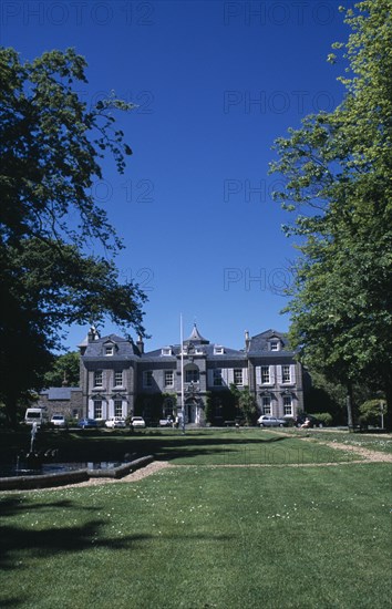UNITED KINGDOM, Channel Islands, Guernsey, St Martins. Saumarez House. View of front entrance from green lawn.