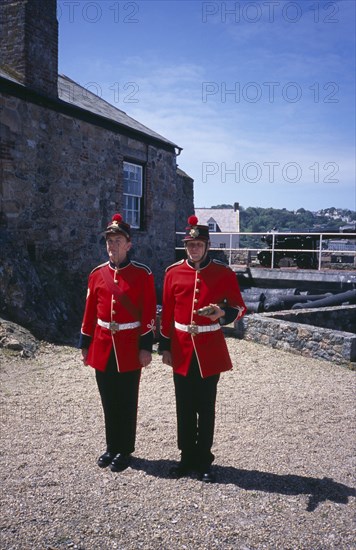 UNITED KINGDOM, Channel Islands, Guernsey, St Peter Port. Castle Cornet. Noon Day Guards standing in grounds.