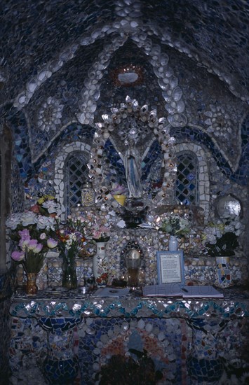UNITED KINGDOM, Channel Islands, Guernsey, St Andrews. Les Vauxbelets.The Little Chapel. Interior with detail of shrine.