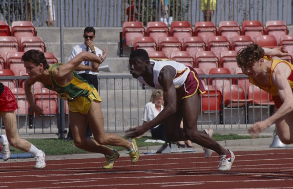 20068163 SPORT Athletics Track Competitors in mens track event at school championships.