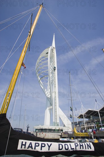 ENGLAND, Hampshire, Portsmouth, The Spinnaker Tower the tallest public viewing platforn in the UK at 170 metres on Gunwharf Quay with moorings in the foreground