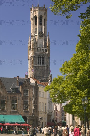 BELGIUM, West Flanders, Bruges, "View of the Belfort from the Burg, people walking in the street."