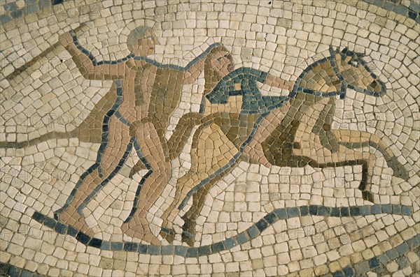 MOROCCO, Volubilis, Detail of mosaic depicting horseman and figure with club.