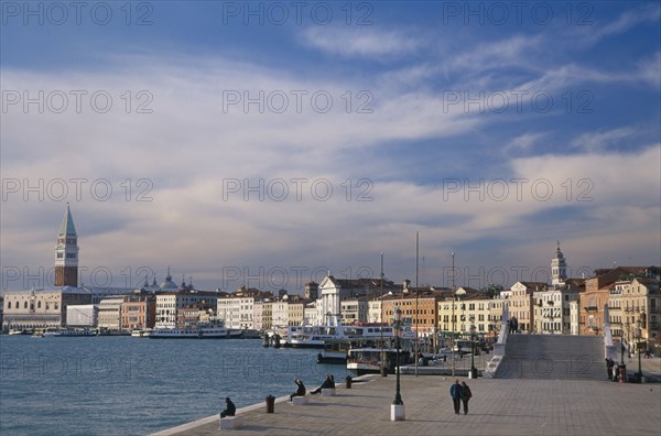 ITALY, Veneto, Venice, Castello.  View along Riva degli Schiavoni towards San Marco beside the Canale de San Marco.