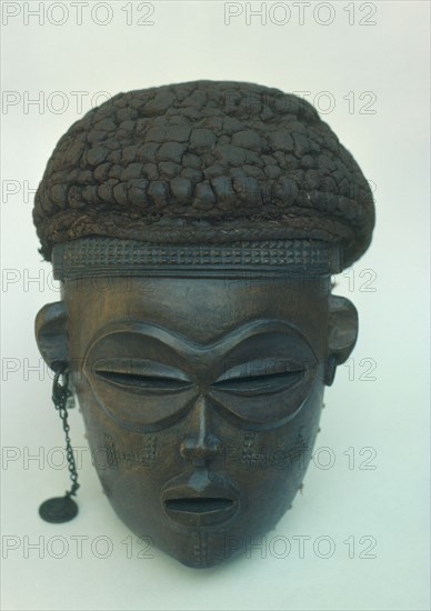 ANGOLA, Mask, Mukishiwa Qhwu Tchokwe carved wooden mask.