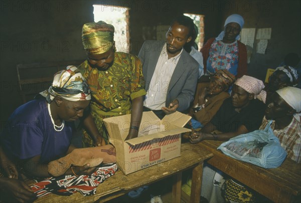 KENYA, Kibwezi, Training traditional midwives or birth attendants with the aid of a cardboard box and ragdoll.