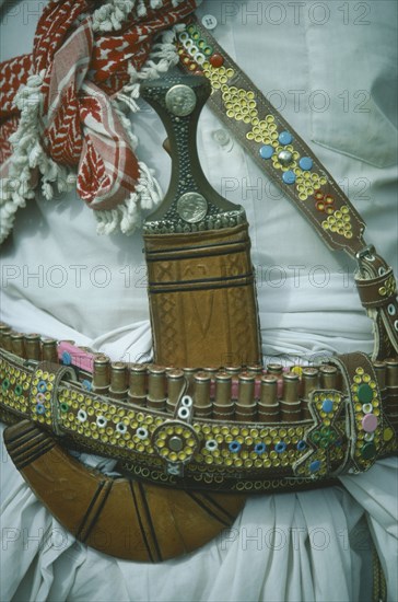 YEMEN, People, Jambia.  A curved dagger worn at the waist with a decorative belt and symbolic of place in social hierarchy and loyalty to tribal membership.