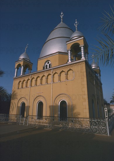 SUDAN, Omdurman, "Tomb of the Madhi, Muhammad Ahmad ibn as Sayyid Abd Allah.  Exterior with domed silver roof and decorative wrought iron railings."