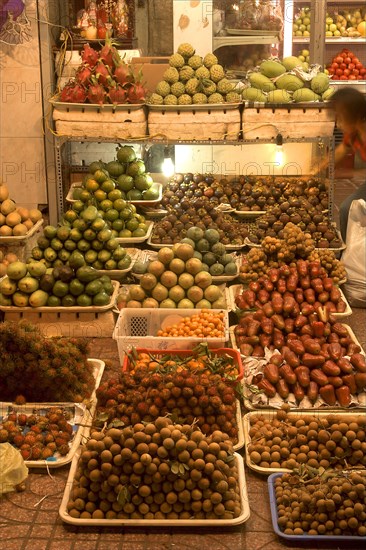 VIETNAM, South, Ho Chi Minh City, Fruit shop lit up at night