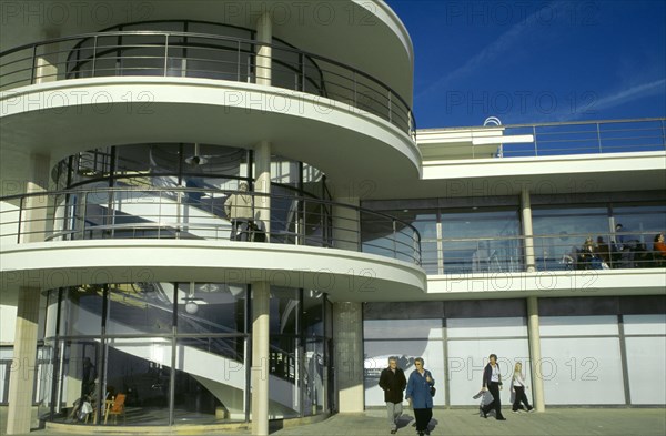ENGLAND, East Sussex, Bexhill on Sea, De La Warr Pavilion. Exterior view of staircase section with visitors near entrance.