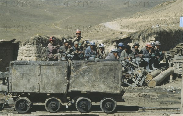 BOLIVIA, Potosi, Cerro Rico, Miners chewing coca leaves before a shift at Candelaria Mine.