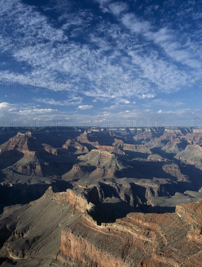 USA, Arizona, Grand Canyon, View over Mohave Point seen in late evening with clouds breaking in the sky