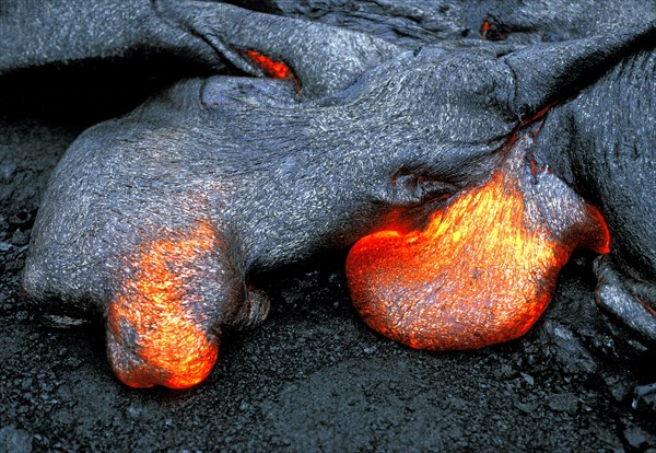 USA, Hawaii,  The Big Island, "Flow of pahoehoe or ropey lava, near the Chain of Craters Road on the slopes of Mt Kilauea volcano, in the south of this, the most volcanically active Hawaiian island ."