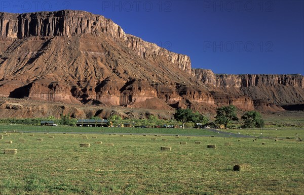 USA, Utah, Colorado River, Irrigated ranch by the Colorado River adds green to this otherwise arid landscape of sandstone canyons north east of Moab.