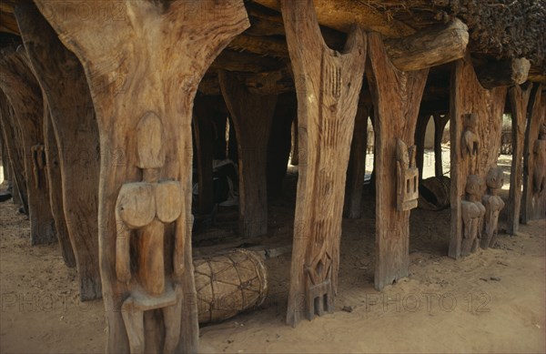 MALI, Architecture, "Detail of Dogon Togu na or case a palabres, open sided meeting place of the village elders with thatched roof of millet stalks supported by carved wooden posts. "