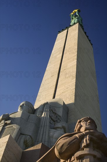 LATVIA, Riga, "Detail of the Freedom Monument. Milda, the figure on top of the pediment holds 3 stars, representing the regional districts of Latvia. "