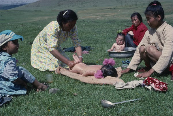 MONGOLIA, People, Traditional massage for sickly babies