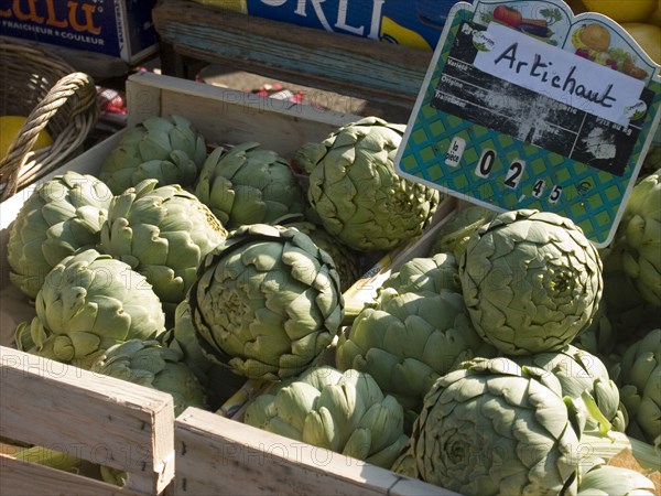FRANCE, Deux Sevres Region, Poitiers, Artichokes on sale at the market in the town of Rouille.