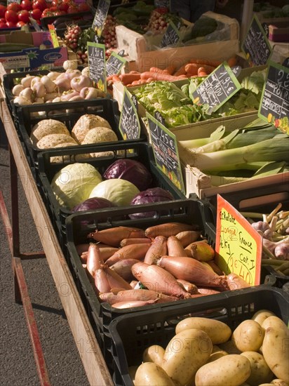 FRANCE, Deux Sevres Region, Poitiers, Fruit and vegetables on sale at a market stall in the town of Rouille.