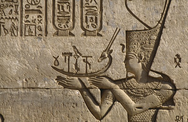 EGYPT, Nile Valley, Dendara, Temple of Hathor.  Detail of frieze depicting the pharaoh making offerings to Hathor.