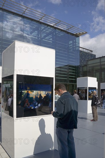 ENGLAND, East Sussex, Brighton, Photographic exhibition of Tsumani images outside the public library as part of the festival.