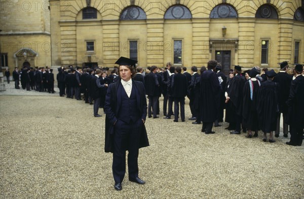 ENGLAND, Oxfordshire, Oxford, Students attending matriculation ceremony.