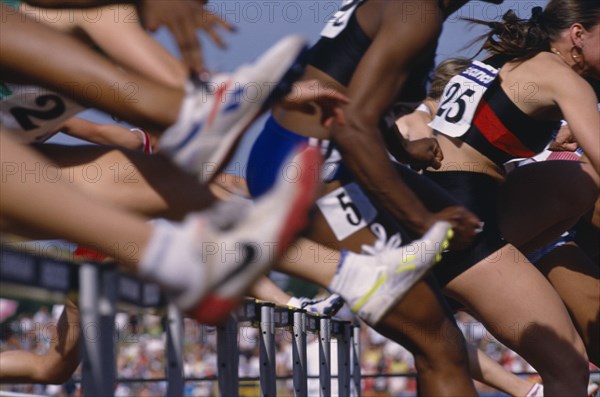 20077503 SPORT Athletics Hurdles Cropped shot of competitors in hurdle race.