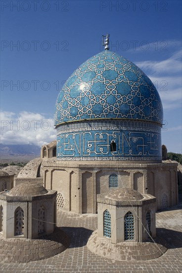 IRAN, Kerman Province, Mahan, Safavid Cupola. Tomb of the Sufi Dervish Shah Nematollah Vali. Fourteenth Century turquiose and white patterned tiled domed roof