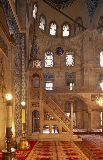 TURKEY, Istanbul, Sokollu Mehmet Pasa Camii.  Mosque commissioned in 1571 by Sokullu Mehmet Pasa.  Interior showing  highly ornamented mimber and tiled wall.