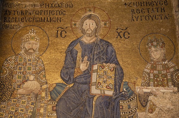 TURKEY, Istanbul, Detail of mosaic painting in Aya Sofya depicting Christ with Emperor Constantine IX Monomachus offering a bag of coins and the Empress Zoe holding a scroll.