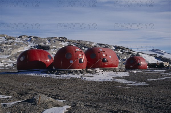 ANTARCTICA, Ross Sea Region, Red capsule fibreglass accommodation for remote field camps which can be transported by helicopter