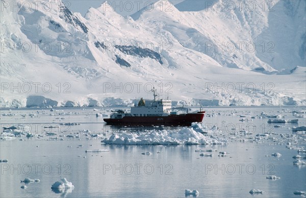 ANTARCTICA, Transport, British Ice Patrol ship HMS Endurance on water with snow covered mountains behind
