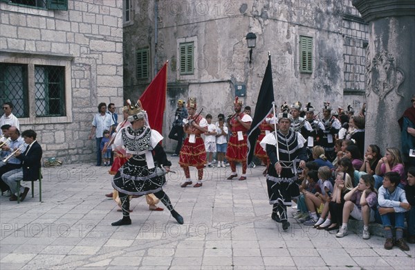 CROATIA, Korcula Island, Men in costume performing traditional Moreska dance which is over four hundred years old