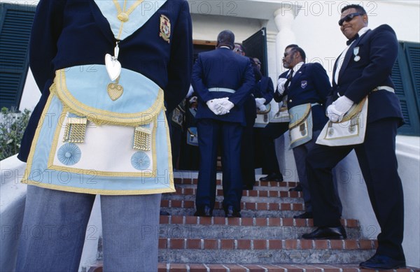 BERMUDA, St Georges, Cropped view of freemasons wearing regalia for the Peppercorn ceremony.