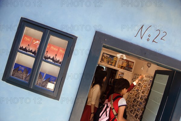 CZECH REPUBLIC, Bohemia, Prague, Tourists in one of the house shops in Golden Lane within Prague Castle in Hradcany