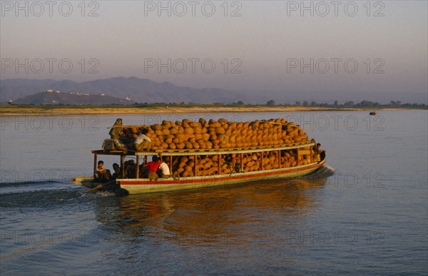 MYANMAR, Transport, Boat full of clay pots on the Irrawaddy River between Mandalay and Mingun.